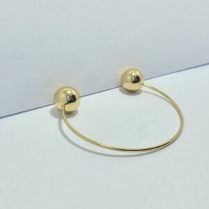 PULSEIRA BRACELETE COM BOLA DOURADA NAS PONTAS